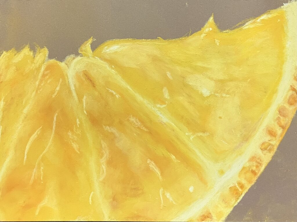 Close up van een sinaasappelpartje - pastelkrijt